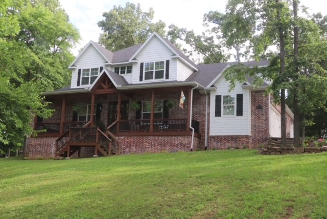 GORGEOUS craftsman farmhouse! Sitting on beautiful lot full of trees at the end of a cul de sac you will have plenty of room to play outdoors while also enjoying life in one of Fayetteville's best neighborhoods. The stunning front porch is the perfect place to watch the deer and squirrel cross the hillside of the front yard. Or enjoy a cup of coffee in the morning while listening to the birds sing on the screen porch out back. This 4 bedroom, 3.5 bath home has a open floor plan with a massive 30+ foot ceiling in the living area. Plenty of natural light beams through the large windows throughout the home. Custom crafted cabinetry throughout offers more than enough storage and space. The master suite boasts a large tiled walk in shower with a rain head, his/her walk in closet space and a fireplace. You don't want to miss this home. Schedule a showing today and come see this jewel!