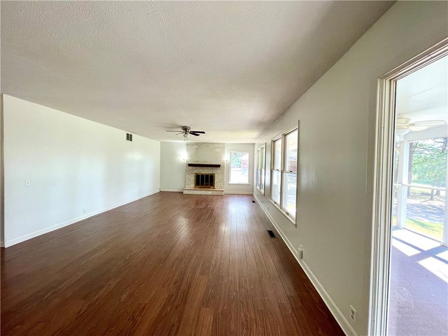 This 4 acre property presents a rare opportunity to own more than a small lot within the city limits, boasting a picturesque park-like setting and effortless access to local amenities. The 2-bedroom, 2-bathroom residence offers 1680 sq ft of living space, office/flex room off the kitchen, further enhanced by a spacious 288 sq ft screened porch/sunroom in the front entrance of the home. A separate 10x16 building provides versatility for use as an art studio, office, or guest room.Ample storage space is available in the garage. This home showcases character and charm, set amidst a serene 4-acre backdrop within the city limits.With convenient access to Hwy 412, discover NW AR's comprehensive trail network featuring biking, hiking, and mountain biking trails.Enjoy a variety of outdoor pursuits, including camping, fishing, and water sports, with easy access to Beaver Lake, War Eagle Creek, and the Buffalo National River. Utility availability is the responsibility of the buyer or buyers agent.