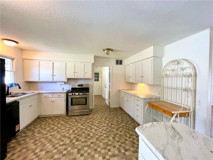 This 4 acre property presents a rare opportunity to own more than a small lot within the city limits, boasting a picturesque park-like setting and effortless access to local amenities. The 2-bedroom, 2-bathroom residence offers 1680 sq ft of living space, office/flex room off the kitchen, further enhanced by a spacious 288 sq ft screened porch/sunroom in the front entrance of the home. A separate 10x16 building provides versatility for use as an art studio, office, or guest room.Ample storage space is available in the garage. This home showcases character and charm, set amidst a serene 4-acre backdrop within the city limits.With convenient access to Hwy 412, discover NW AR's comprehensive trail network featuring biking, hiking, and mountain biking trails.Enjoy a variety of outdoor pursuits, including camping, fishing, and water sports, with easy access to Beaver Lake, War Eagle Creek, and the Buffalo National River. Utility availability is the responsibility of the buyer or buyers agent.