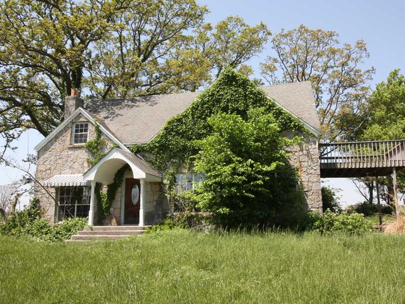 FANTASTIC DEVELOPMENT POTENTIAL OR PRIVATE ESTATE. CITY OF ROGERS, BENTONVILLE SCHOOLS. ROGERS SAID IT WOULD BE EASY TO DIVIDE INTO ESTATE LOTS (5-7AC). GREAT LOCATION. PONDS, OUTBUILDINGS, FARMHOUSE WITH LOTS OF CHARACTER. BUY THIS PIECE OF HEAVEN,BEFORE SOMEONE ELSE DOES AND YOU WISH YOU HAD.