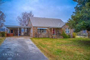 Nice 3 bedroom 1 bath home with metal roof on 6.65 acres with gorgeous views of Gaither Mountain. Large barn with pipe corral and numerous other outbuildings. Year round spring, pond, and several fruit trees throughout the property. Hot tub conveys.