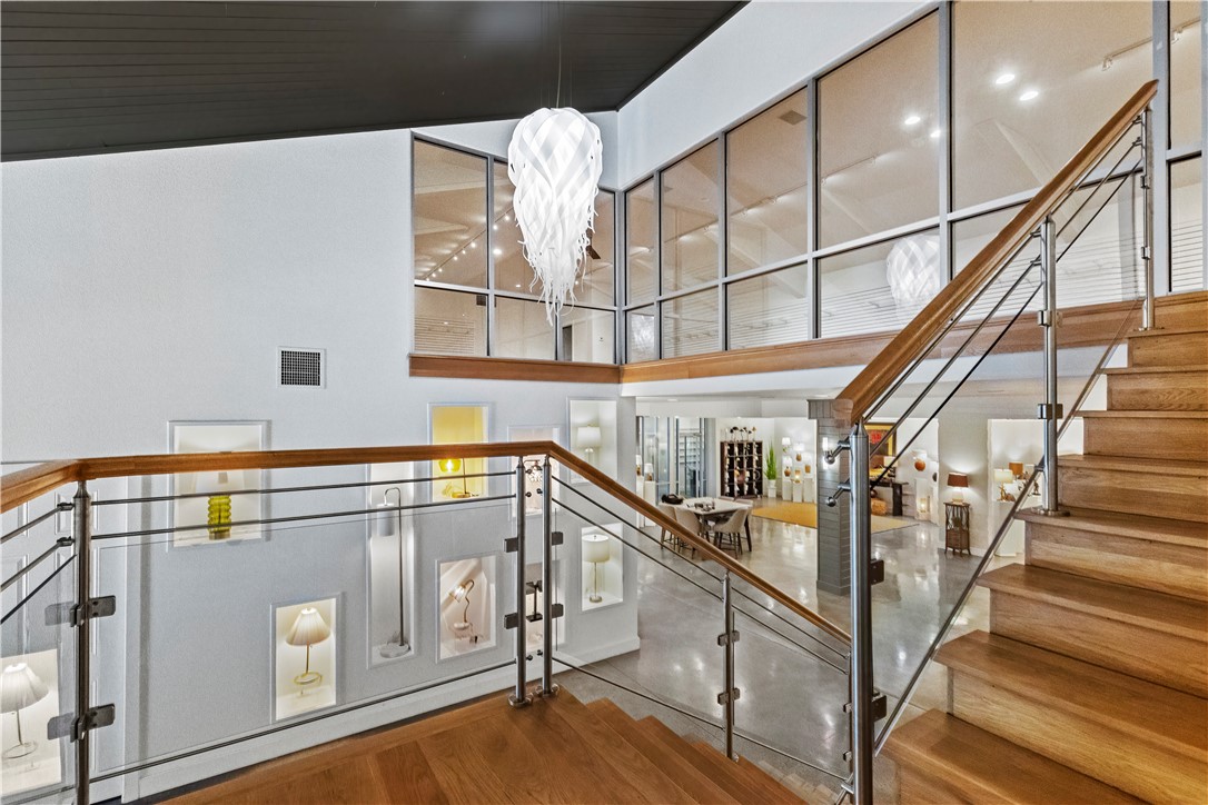 This exceptional 20,000 sq ft building showcases a breathtaking 13,500 sq ft modern showroom and office spaceāundeniably one of the most striking in the regionāfeaturing designer kitchens with custom cabinetry and top-of-the-line finishes throughout. Continuous power access with outlets spaced every few inches around the entire perimeter of both showroom levels, ensuring maximum versatility for displays and operations. Every office is thoughtfully designed with elegant built-in cabinetry, creating a refined and highly functional workspace. An additional 6,500 sq ft of well-organized warehouse space with extensive shelving adds valuable utility. The property also includes a 1.25-acre adjacent lot, which offers potential for additional parking or future development. A rare and remarkable opportunity with endless potentialāthis property truly must be seen to be appreciated.