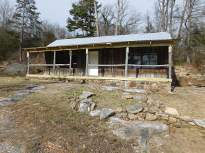 CABIN NEAR PRUITT IN NEWTON COUNTY FOR SALE. This cabin is located in the Ozark Mountains and Buffalo River National Park Region of Arkansas. O It just 1.9 miles from the Pruitt Access of the Buffalo National River and just 5 miles from the Ozark National Forest. This cabin could be a used as a vacation home or used as a rental property.