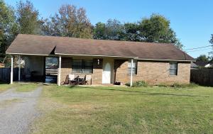 Nice brick home, 3 bedroom, 2 full bath. Open living room to kitchen with eating bar. Storage room off carport and back deck. Privacy fenced yard. Great buy in the Pottsville area.