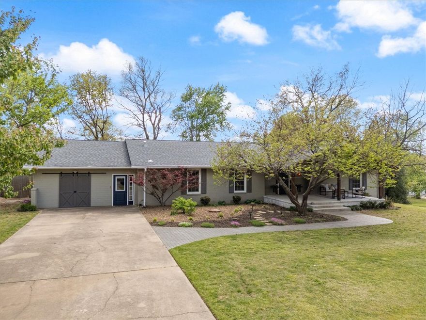 Beautiful home in a prime location just minutes from schools, John Brown Univ, & downtown Siloam Spgs! This spacious property offers 4 bedrooms, 3.5 baths, plus a dedicated office, an additional guest room with a Murphy bed, & a versatile bonus room—providing flexible living options for any lifestyle. Enjoy multiple living areas, including a second living room perfect for entertaining or relaxing. Relax & unwind on the amazing covered front porch—perfect for morning coffee or evening sunsets. The light-filled primary suite features elegant French doors that step outside to a large fenced backyard surrounded by private land, offering both space & seclusion. The incredible deck incl a covered area ideal for outdoor cooking  & entertaining. Backyard highlights continue w/ a built-in trampoline & firepit! A heated & cooled outbuilding in the backyard, prev used as an office, adds even more functional space for work or hobbies. This home truly blends comfort, convenience, & outdoor living in one exceptional package!