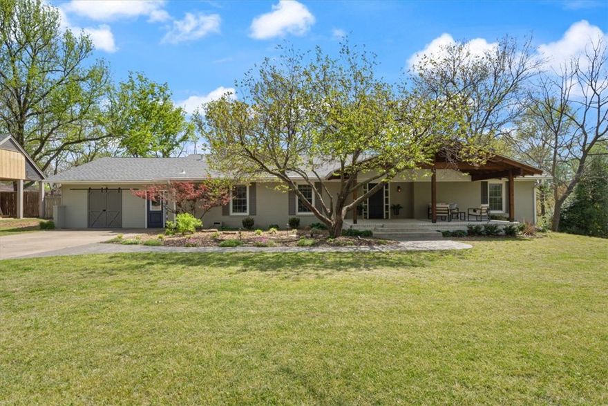 Beautiful home in a prime location just minutes from schools, John Brown Univ, & downtown Siloam Spgs! This spacious property offers 4 bedrooms, 3.5 baths, plus a dedicated office, an additional guest room with a Murphy bed, & a versatile bonus room—providing flexible living options for any lifestyle. Enjoy multiple living areas, including a second living room perfect for entertaining or relaxing. Relax & unwind on the amazing covered front porch—perfect for morning coffee or evening sunsets. The light-filled primary suite features elegant French doors that step outside to a large fenced backyard surrounded by private land, offering both space & seclusion. The incredible deck incl a covered area ideal for outdoor cooking  & entertaining. Backyard highlights continue w/ a built-in trampoline & firepit! A heated & cooled outbuilding in the backyard, prev used as an office, adds even more functional space for work or hobbies. This home truly blends comfort, convenience, & outdoor living in one exceptional package!