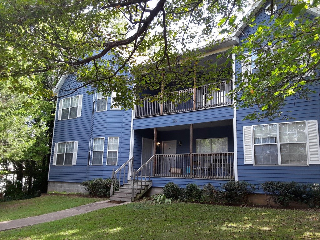 Fabulous location! Experience downtown Fayetteville! Lovely upstairs 2 bedroom, 1 bath apartment in 4-plex, 883 square feet. Living room has beautiful fence doors leading to awesome balcony overlooking School St. Kitchen appliances include full-size refrigerator, stove and dishwasher. Washer and dryer in unit. This is a place you will want to call home. Walking distance to the U of A, downtown restaurants, entertainment and the Fayetteville Square