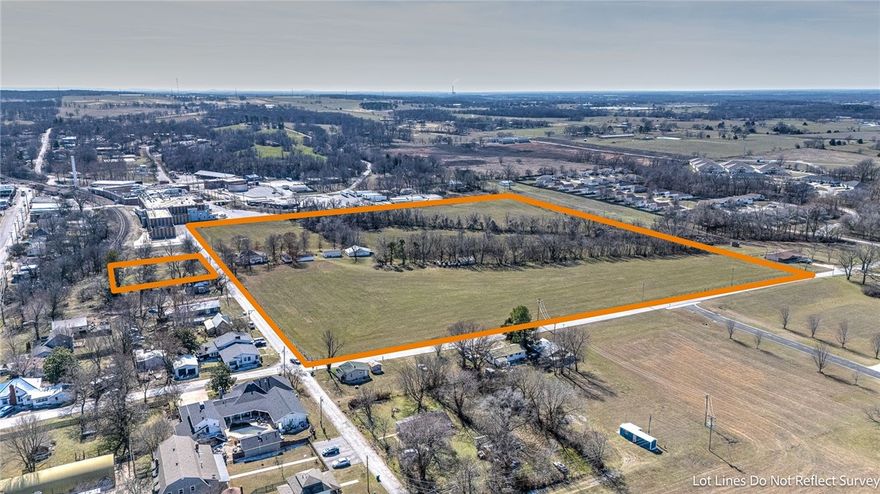 Unique investment opportunity and Development Opportunity in Northwest Arkansas. 
Quaint Farmhouse setting with multiple outbuildings on 20 beautiful acres inside the city limits.
Industry and New Developments all around. Please call for private Tour of the Property. PRICE IMPROVEMENT.