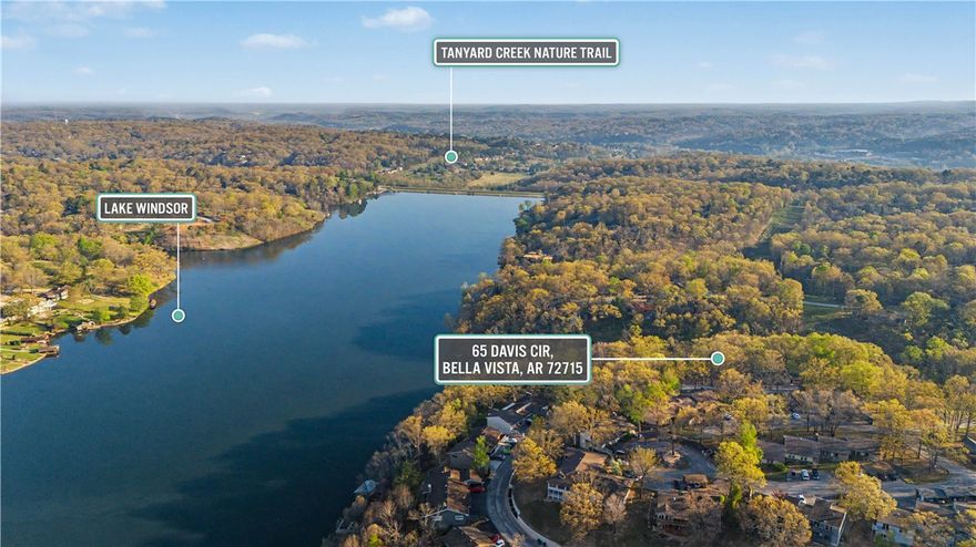 Positioned next to Lake Windsor, 65 Davis Cir offers a rare blend of lifestyle & income potential in Bella Vista. Currently operating as a successful short-term rental, this property gives buyers flexibility - continue generating revenue or enjoy it as a full-time residence or second home.

Location is the driver here with view being lake front, minutes from lake access, the Back 40 trail system, golf courses, & everything that makes Bella Vista one of Northwest Arkansas’ most sought-after outdoor communities. Easy access into Bentonville adds long-term upside with proximity to the Walmart campus, dining, & entertainment.

Whether you’re looking for a turnkey STR, a weekend retreat, or a place to plug into the NWA lifestyle, this is the kind of opportunity that checks multiple boxes in one move.