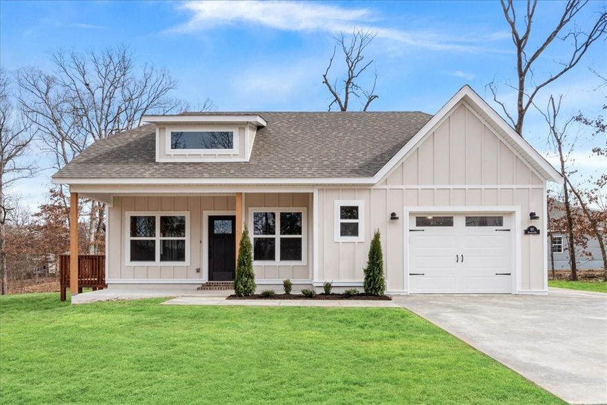 Discover this stunning new cons't craftsman style home located 1 minute from the Loch Lomond boat launch and provides easy access to Highlands Golf Course, Branchwood trail, & 1-49. This exquisite home sits on a FLAT .28 acre wooded lot and boasts high-end finishes throughout! Step inside to find a stylish open-concept layout, adorned with NO carpet. The focal point of the home is the kitchen, equipped with custom cabinets, a wood hood, luxurious countertops, & a large kitchen island. You'll love cooking with premium black stainless steel appliances, including a gas range. Retreat to the primary bath, where you'll find a spacious walk-in tile shower & double vanity. 2 bedrooms / 2 baths. Plus, take advantage of $3,500 in buyers closing costs, courtesy of the builder's preferred lender! Approx completion date - 6/16/25