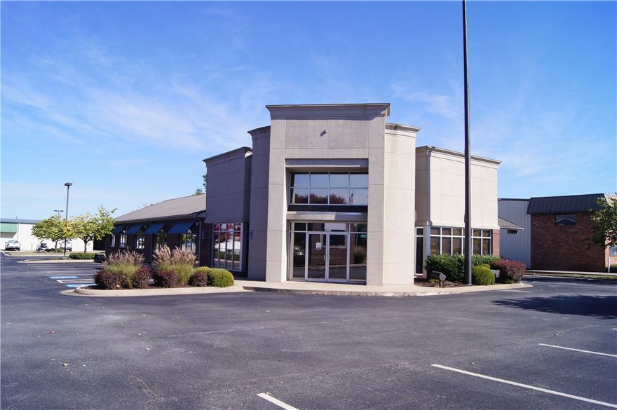 Ready to move in.  4000 SQ FT professional office building with 26 parking spaces.  Great location on West Sunset just 1 block from Harp's & Neighborhood Market.  (All furnishing included in price)  7 private offices, conference room, break room, lobby area.  Perfect for Professional Office or Utility Company.  2 Drive thru lanes.Traffic Count 26,000 daily.