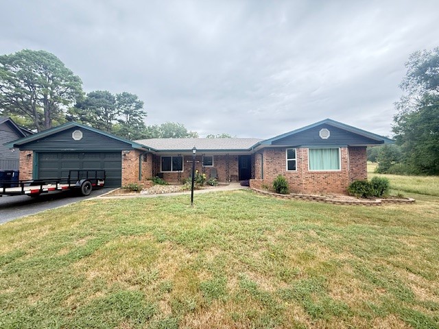 Your new home awaits on the 4th hole of Lion's Den Golf Course! Nestled between Mount Magazine State Park, Mount Nebo State Park and the shores of Lake Dardanelle, this location offers something for everyone from fishing, boating, water sports, SxS, hunting, hiking and of course golfing! With ammenities to include a fireplace, wet bar, new appliances, new windows, new french doors, new light fixtures and new curtains! Step outside to your private backyard oasis featuring a huge rock patio, rock fire pit, built-in BBQ pit, and hot tubāperfect for starry nights, summer cookouts, or unwinding after a day on the course. With beautiful landscaping, large trees, a hot tub, gazebo, golf course frontage and two public boat ramps nearby what more could you ask for?! Live where others vacation. Schedule your private tour today!