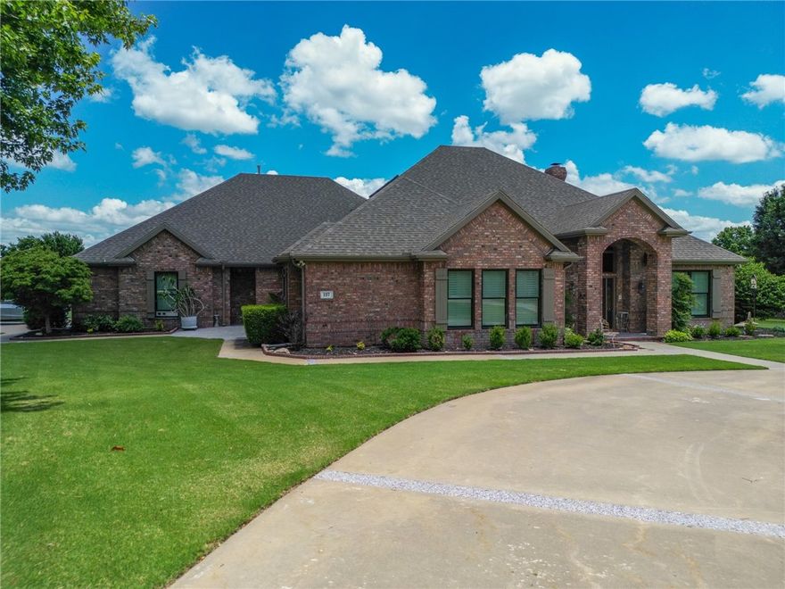 Built to handle anything and loaded with upgrades—this place brings comfort, security, and space all in one. Inside, nearly everything’s been updated, including the kitchen, baths, flooring, lighting, and windows. There’s a concrete safe room, high-end generator, custom shutters, and fresh paint throughout. The covered porch has a new surface, the garage has new doors and openers, and there’s a deep 720’ well for peace of mind. Outside, you’ll find an outbuilding with upstairs storage, a garden full of fruit, and an additional 7 acres currently home to goats. Ready for whatever life brings.