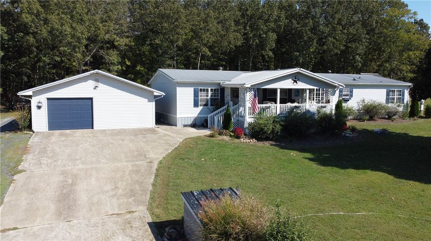 Nice Views from this home on 10.78 Acres M/L with 4 BR, 2 BA, 2,560 SQFT, walk-in closets in every bedroom, gas fireplace, one car oversized garage, storm shelter, covered decks, metal roofs, several outbuildings, garden area, walking paths through the trees, pond, and so much more.  Less than 3.5 miles to the Buffalo National River Park. The house has public water and the outside faucets are on a water well. This place would make a great homesteading property. Call today to schedule a showing!!