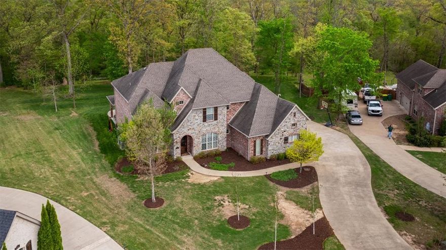 Welcome home to 1484 Le Chesnay Drive, where privacy, space, and high-end finishes come together on over 1.5 acres of flat, wooded beauty.
This stunning 4,700 sq ft home offers 4 bedrooms, 3 full baths, 2 half baths, a dedicated office, and a versatile flex room providing ample space for every member of the family to live, work, and unwind. Located in the upscale, established community of Versailles, set across 200 acres of beautifully wooded landscape, this neighborhood offers a truly elevated lifestyle. Just minutes from Ardis Ann Middle School and Elm Tree Elementary, convenience meets refinement. Inside, real hardwood floors and high-end finishes flow throughout, creating a warm and sophisticated atmosphere from the moment you enter. The 3-car garage features epoxy floors and excellent organizational space.  Step outside to enjoy the peace and privacy of your wooded lot, a serene, natural backdrop.  Escape the ordinary live surrounded by trees, space, and elevated design