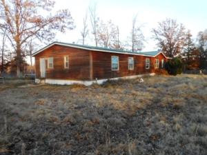 1998 28X80 American Price Double wide on just under 100 acres; home was 4 bedroom & could be changed back easily; Open floor plan; Good privacy; excellent hunting