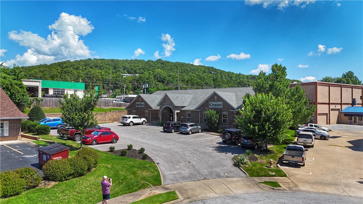 • 4,960 square feet on 0.5 acre
• 24 Executive Suites with private parking
• Fully leased with flexible, month-to-month tenants
• Great location in the heart of Fayetteville, directly off of College Avenue (US-71 Business) in Urban Corridor
• Occupant ready, second-generation office space with minimal capital improvement needs
• Ideal for Owner-Operators or Investors: Options may include occupying all or part of the space, increasing rents to secure long-term leases, and more