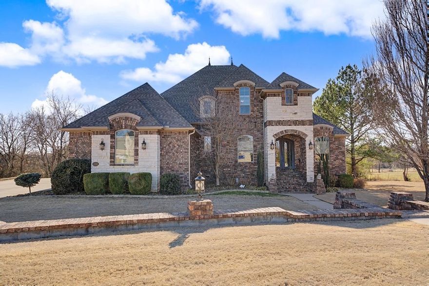 This exceptional custom-built home combines luxury craftsmanship with high-end upgrades throughout—all overlooking Brush Creek Golf Course. From the moment you arrive, the striking double wrought iron front doors set the tone for the quality found inside. The chef’s kitchen is a true centerpiece with a large copper farmhouse sink, complemented by a dedicated coffee bar with its own copper sink and a wet bar featuring a built-in ice maker. The spacious primary suite offers a spa-like retreat with a very large walk-in shower. Step outside to a beautiful half acre backyard featuring an underground sprinkler system, wrought iron fencing, and a large covered patio with a brick fire pit and built-in seating—perfect for relaxing while enjoying golf course views. Additional highlights : 400-amp electrical service with 50/30 amp RV hookups, Two gas tankless water heaters,Golf cart garage in basement.Major updates include both HVAC units replaced in 2018 (with remaining warranty) and a brand-new roof and gutters in 2025.