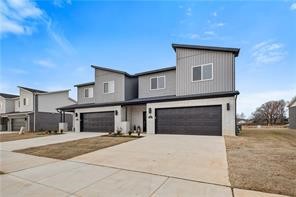 Welcome to modern less than one year old townhome at Sun Meadows Phase 2, Centerton's premier upscale townhome enclave! This newly enhanced townhome features vented gas stove, large, expansive windows, tall, vaulted ceilings and ample storage. Downstairs you will find Kitchen, living room, powder bath, pantry , primary suite with beautiful floor to ceiling tiled shower, Dual sink Vanity, a large walk in Primary closet and coat closet at the entry. Upstairs you will find two spacious bedrooms with larger closets and a spacious bath. Newer washer, Dryer and Refrigerator included. Located just blocks from Bentonville West High School, sports facilities, and shopping, these residence offers convenience and sophistication. The backyard offers a fully sodded yard with a wooden privacy fence. In close proximity to top rated schools, offices, medical/retail & restaurants, and more. Background, credit check required.