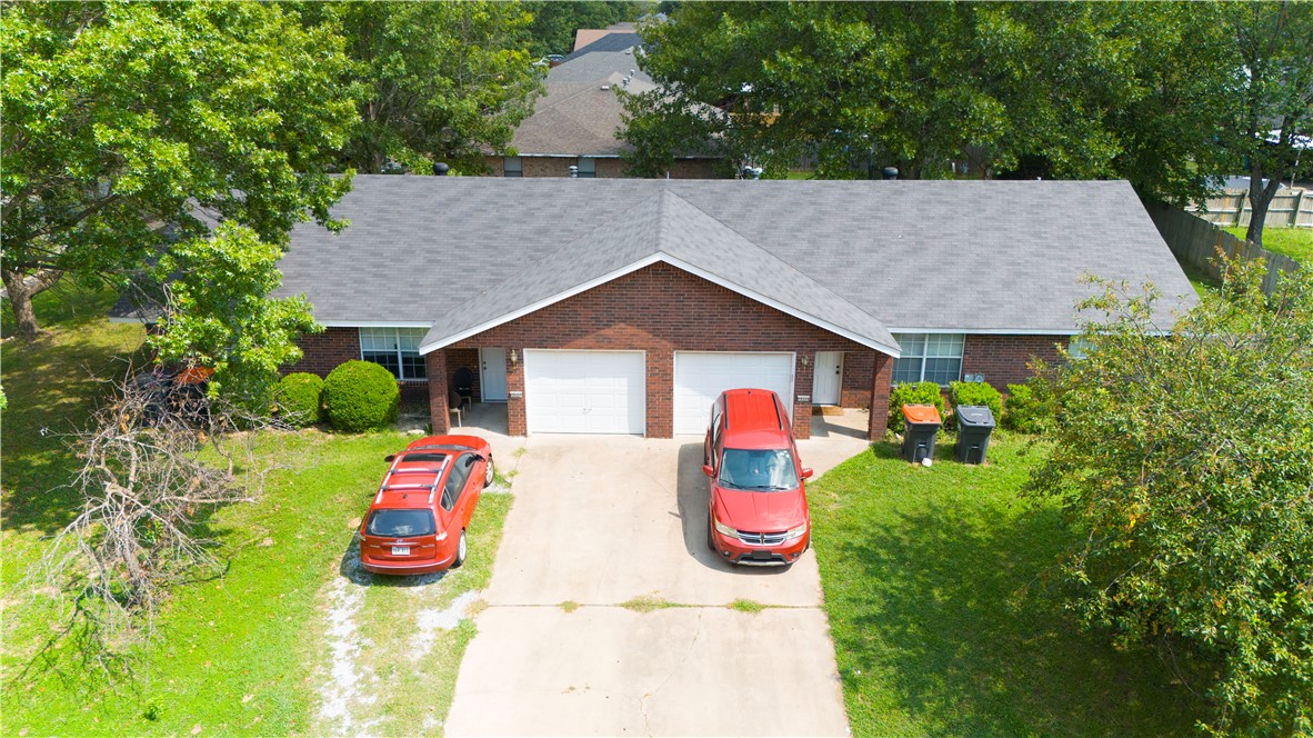 Rare opportunity to own a well-maintained duplex in Springdale with flexible options for living or investing. Each unit offers 2 bedrooms, 2 bathrooms, 1,202 sq ft, and a 1-car garage, with a spacious layout and private fenced backyard. Recent improvements include a new roof and new HVAC in Unit B. Both sides are on month-to-month leases, offering the option to live in one unit and rent the other or lease both. Conveniently located near schools, parks, and major highways. Ideal for buyers looking to reduce monthly housing costs while building long-term equity. Showings available with appointment.