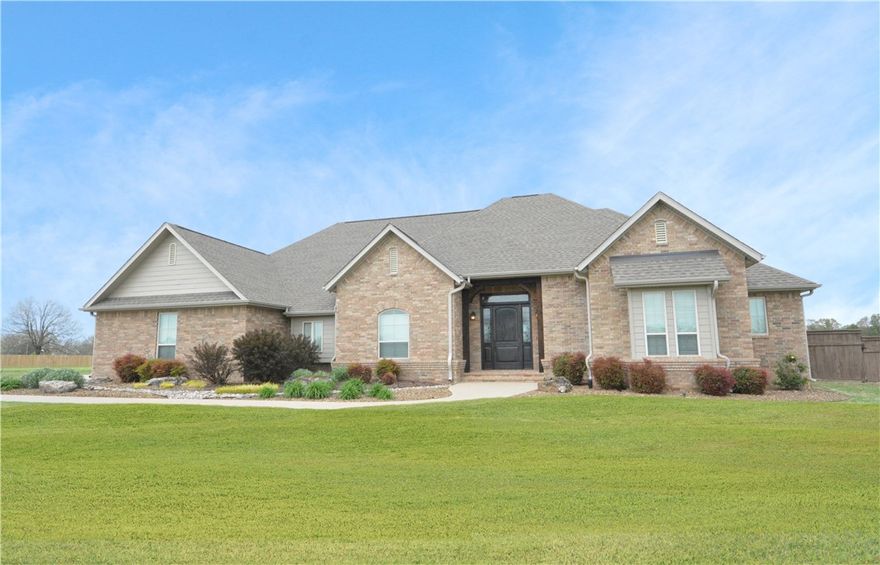 This well kept home sits on 1.05 acres  . Great Open Living Floor plan ,  Amazing kitchen & pantry !
Wood flooring in living room, kitchen ,Formal dining, office,  bedrooms and hallways .  All rooms are good sized and this home features a wonderful  primary bedroom & bath  suite with double walk-in shower . 
Backyard features an inground  pool with lots of deck area .  Enjoy   enclosed all seasons patio/sunroom . 
Upstairs has a large 2nd living area with a full bathroom.  Large side entry 4 car garage ! 
This is a wonderful neighborhood  with easy access to XNA . New roof &  gutters  just installed May 22,2025. Privacy fencing is well inside the actual property lines . Newer heat & air upstairs split unit