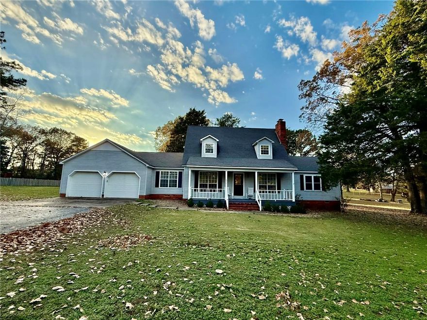 Find the perfect blend of country living and modern comfort in this 2,414 sq ft two-story home on a gorgeous 1.5-acre lot in a peaceful rural neighborhood. 

The thoughtfully designed interior showcases a unique double-sided fireplace shared between the living room and primary bedroom. You'll love the bright and spacious sunroom that opens onto the back deck—ideal for morning coffee or evening relaxation—plus a formal dining room, bonus room, and attached 2-car garage.

The main-level primary suite offers privacy with its full ensuite bathroom and direct sunroom access. Upstairs, two bedrooms share a jack-and-jill bathroom, perfect for families or guests.

Step outside to an expansive yard with mature shade trees, a storage building, RV carport, and versatile workshop/barn—perfect for hobbyists or anyone needing extra workspace. Entertain or unwind on the back deck or soak in the tranquil surroundings from the front porch. If you're seeking space, flexibility, and comfort, schedule your showing today!