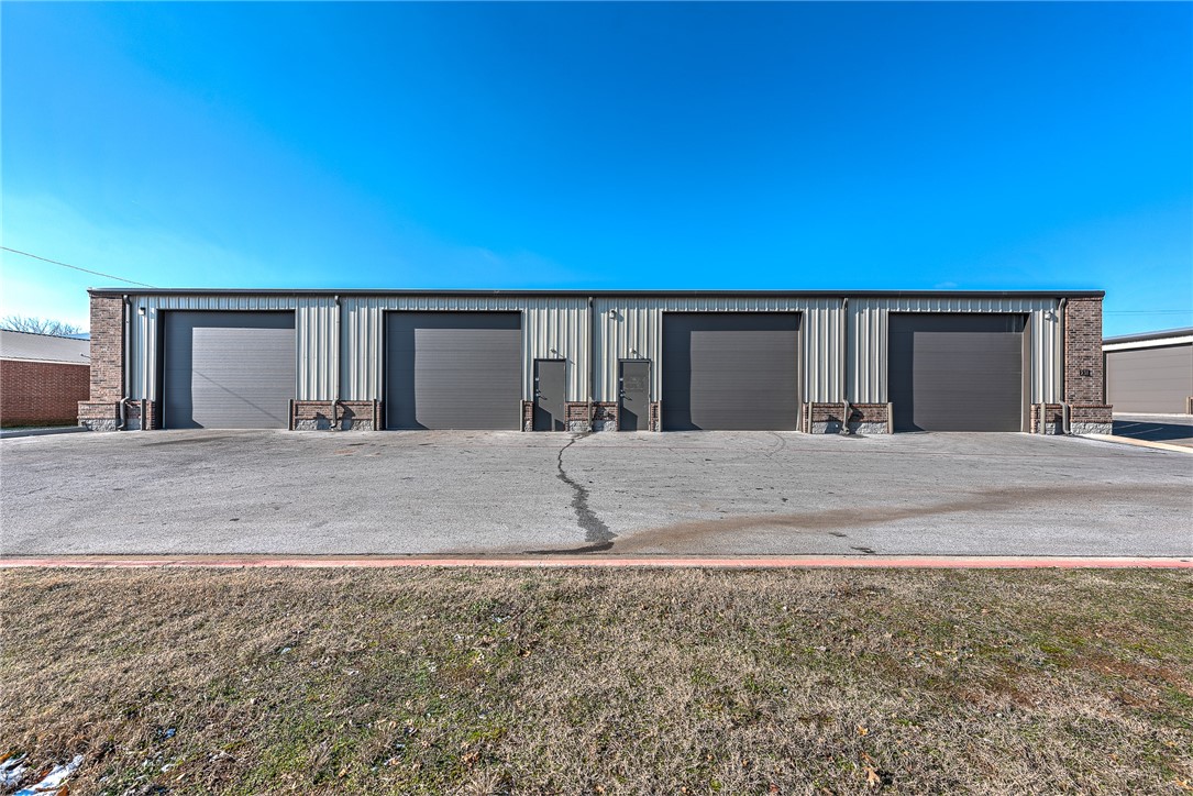 8000 sq.ft. of open heated Warehouse with 6 Drive in doors and road frontage.