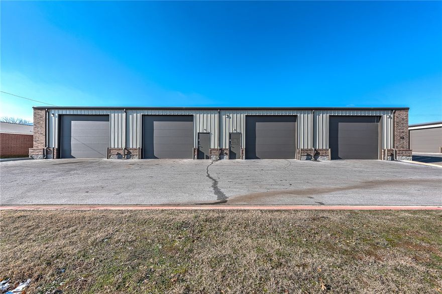 8000 sq.ft. of open heated Warehouse with 6 Drive in doors and road frontage.