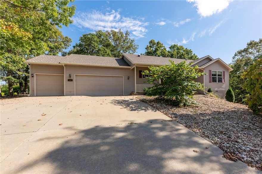 Welcome Home!  New: (2021) HVAC, (2019) Roof, (2018) Kitchen Appliances. Home sits on combined double lot with .64 acre!  Built in 2006, this stunning home features; 3 Bedrooms, 2 Bathrooms, split floor plan, Formal Dining, Sunroom, Dedicated Work space, 3 car garage w/ attic storage, spacious living room w/ gas log fireplace & vaulted ceiling, utility room, covered front patio, deck, mature / professional / low maintenance landscaping. Kitchen; lots of cabinets for storage, solar tube for additional lighting, pantry, and induction stove.  Spacious master suite with spacious walk in closet.  Downstairs; 451 square feet (not included in home square footage) Second Living Room / Weather safe room, workshop / bonus room w/ golf cart accessible door.  On demand hot water heater. Easy access to I49 for easy daily commute. Close to Back 40 Trail Stystem, Metfield Recreation Area.