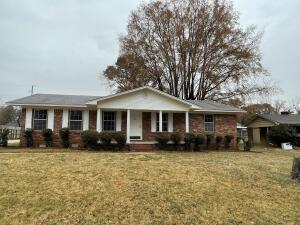 Remodeled with new fixtures, paint and flooring! Three bedroom, two bath home with carport and walkway. Convenient location!
