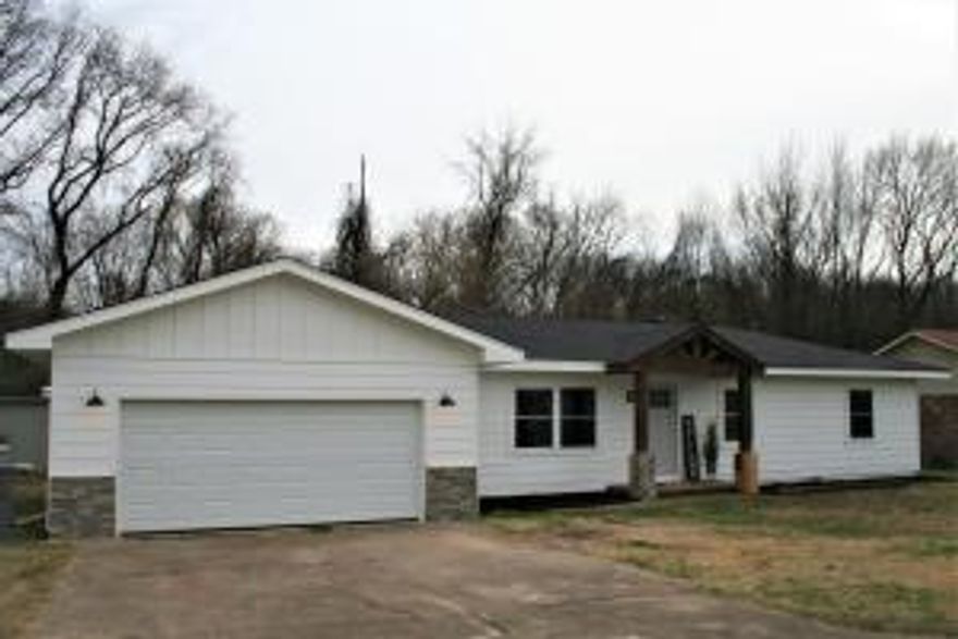 Cute as a button... This 3 bedroom 2 bath house will feel like home. New paint, new floor, new appliances, well almost new everything. You will love the spacious kitchen and living room. There is also a 2 car garage.