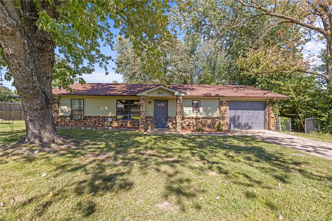 Explore this streamlined investment opportunity with a fully operational Airbnb, ideally located just minutes from downtown Bentonville and the new home office. This property, a proven source of steady bookings, features 1,319 sq ft with 2 bedrooms and 2 bathrooms. It is nestled conveniently across the street from a new multi-use building development set to further enhance its appeal. The property comes fully furnished and is steps away from local biking trails, adding significant recreational value. This turnkey property allows you to generate income from day one.