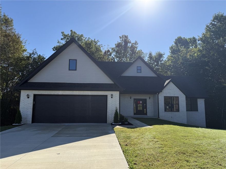 This house is the newest and biggest house in an established neighborhood, this was the last available lot that was not built on for years, until recently.  The walkout basement has a park like setting behind the house, surrounded by tall trees.  Very quiet neighborhood, in great location, minutes from I49, the UofA, etc.