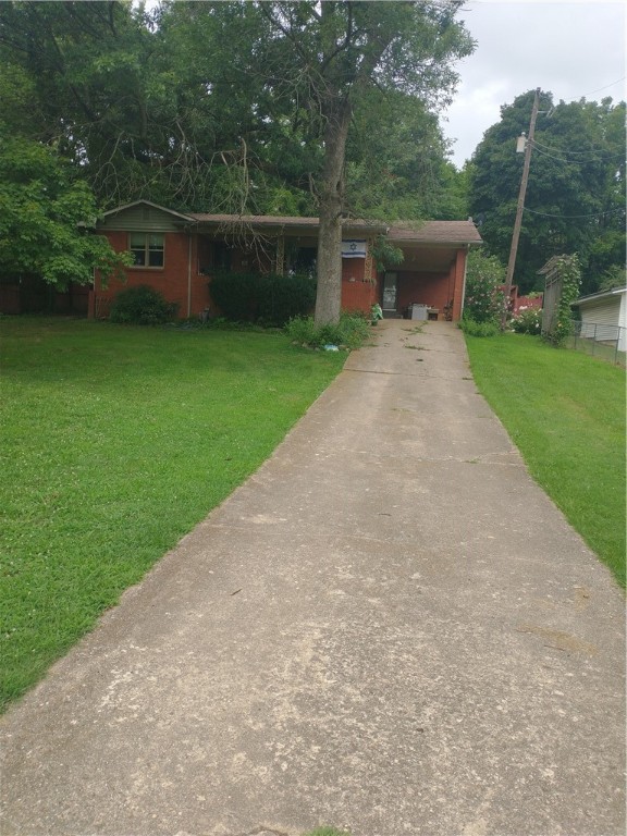 nice solid built home built in 1967, brick, hard wood floors and cermic tile ceiling fans, fence on three sides of lawn also the acreage behind the house is suppose to be fenced-lot of nice trees