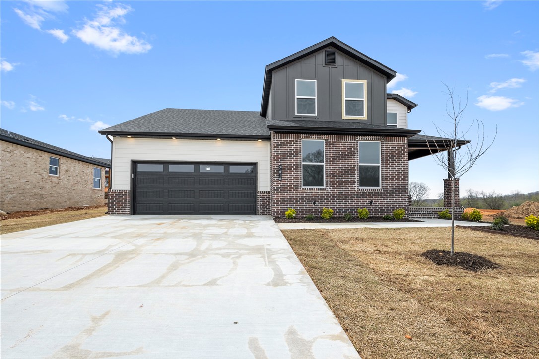 Welcome to The Greens at Sugar Creek. This beautiful two-story home features an open-concept kitchen, dining and living room, 4 spacious bedrooms, 3 full bathrooms, an upstairs landing that makes a great lounge space and a 2-car garage! Enjoy Big Sugar Golf Course is just down the street! Conveniently located to all NWA has to offer! Probuilt