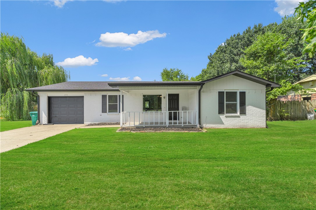 This location and price cannot be beat in Farmington! Walking distance to Jerry "Pop" Elementary! Minutes from I49 and the UofA. New paint, lights, appliances, windows and doors throughout!! Fully fenced backyard with a nice covered front and rear porch!