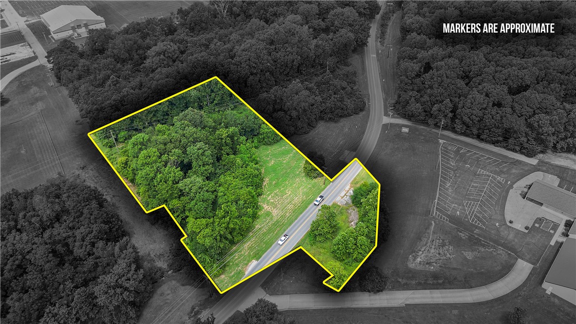 Discover 1.94 beautiful acres just seconds from downtown Gravette and the local high school! This unique property offers a rare blend of natural charm and local history, featuring a scenic brook and the site of Gravetteās very first gas station. Known as "Nebo Valley" before becoming Gravette, the towns very first well is located on site. This property is not simply historical, but rather where Gravette's history began. Mules, horses and humans used this old well for water, with wagons lined up to hydrate man and beast alike. The brook that flows through the property ran a mill, as well as a distillery dating back to the 1850's. Whether you're looking to build your dream home or invest in a special piece of land, this property offers both convenience and character in a peaceful setting close to town. Donāt miss the chance to own a slice of Gravetteās heritage! More land available see NABOR MLS#1315945