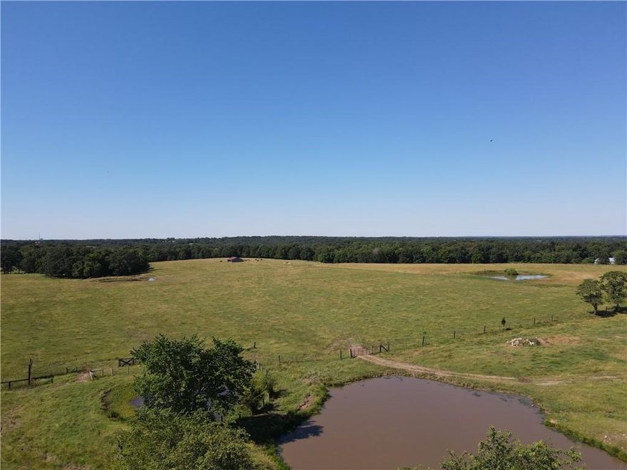 100 Acres of a mix of open and wooded with several springs and ponds.  Located close to town but not too close.  incredible hunting of deer and turkey.  Countless great home sites to build your dream ranch.