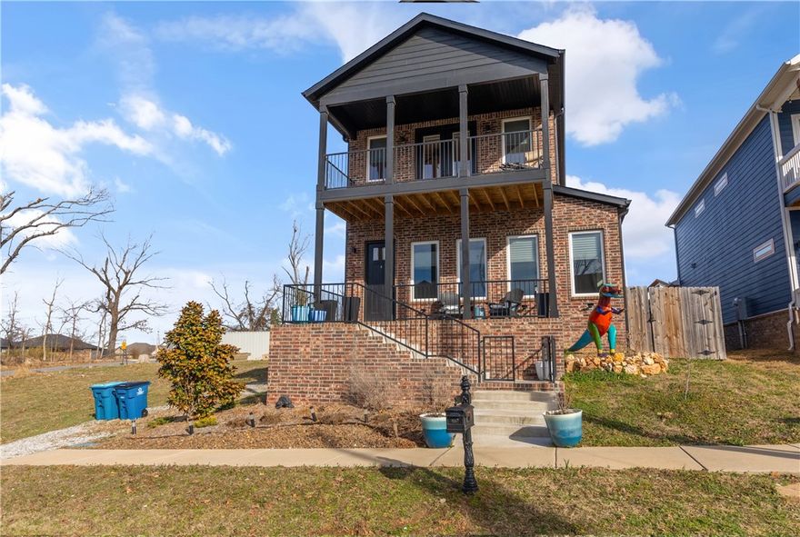 If Location, Quality, And Durability Matter...This Is Your Next Home.
This All-Brick 5-Bedroom, 4-Bath Home In Downtown Bentonville Combines High-End Durability With Unparalleled Access To Trails, The Bentonville Square, And The Crystal Bridges Museum. Featuring Two Main-Level Primary Suites, 2025 Energy-Efficient Upgrades, And A Certified Fortified Roof, The Property Offers A Blend Of Luxury, Privacy, And Resilient Design For Long-Term Living. Seating And Dining Area For All The Entertaining You Will Be Doing. Dedicated Gas Lines For Grill And Fire Pit Eliminate Propane Tanks. Full RV Hookups And Ample Parking Accommodate Guests And Gear. Hot Tub Connections Are Already Installed. Two Sets Of Front-Load Washers And Dryers Simplify Hosting Or Active Family Life. Engineered For Resilience. Designed For Hosting. Positioned For Appreciation. Welcome Home To Uptown On Main.