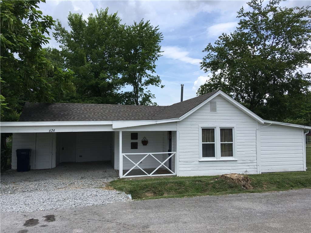 Lovely 3 bedroom home in the middle of town. New paint, carpet and roof. Furnished with refrigerator, oven and stackable washer & dryer. Large yard on both sides of the house for entertaining and playing. Sits on a corner lot. No smoking.