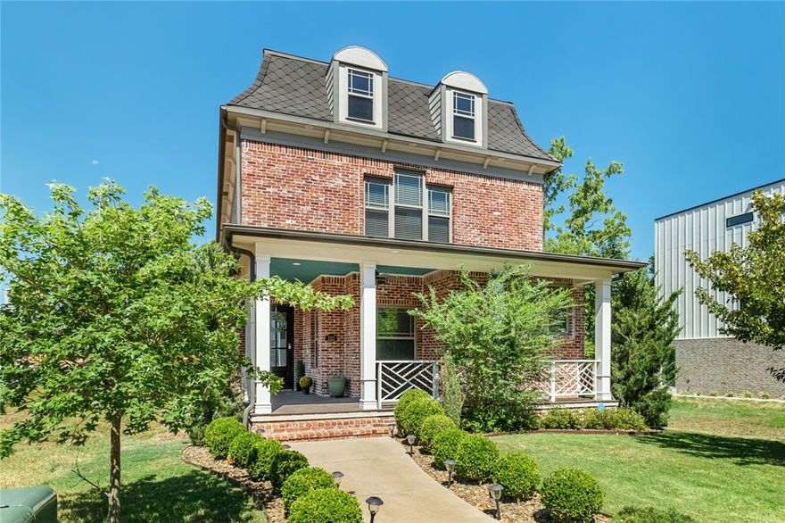 Stunning downtown Bentonville just steps to the Momentary and 8th Street Market. Enjoy relaxing evenings entertaining on your rooftop patio or taking a short walk to Downtown Bentonville for restaurants and shopping. This pristinely appointed three bed, two and a half bath home is walking distance to the new home office campus and an easy hop onto the Razorback Greenway. Gorgeous kitchen with oversize island opening into living area is the heart of the home. Primary suite with exquisite ensuite also located on main level. Upstairs boasts oversized bonus room with kitchenette used additional living area or dedicated work space, two additional bedrooms, and bath. This home is the perfect blend of modern convinces while still enjoying the heart of downtown living. Welcome home!