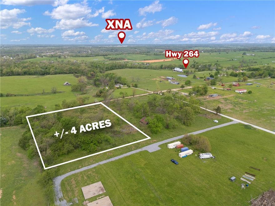 +/- 4 acres of land available just outside city limits, offering the perfect opportunity to build your dream
home, start a hobby farm, or simply enjoy peaceful country living. This prime location is less than 9
minutes from XNA, only 5 minutes from The Creeks Golf Course, and situated just a half mile from
Highway 264, providing convenient access to nearby amenities. Located within the highly sought-after
Bentonville School District, this property combines rural charm with top-tier educational opportunities.
Electric service is available at the street, while a septic system and water well will be needed.
