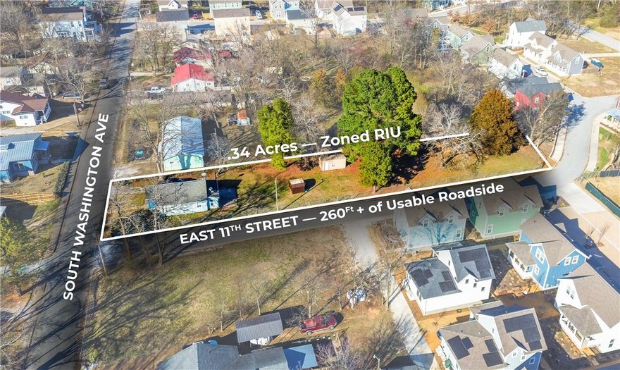 1 bed, 1 bath home (826 sq ft) situated on 0.34 acres with approximately 260 feet of usable road frontage. Recently rezoned to RIU, allowing for higher-density development. Over 25 new cottage homes have been built in the surrounding area within the past two years. Strong infill or redevelopment opportunity in South Fayetteville.