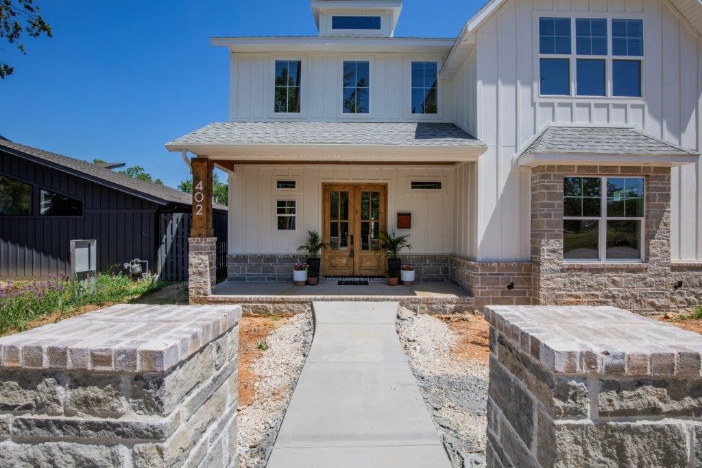 New construction, near completion, walking distance to the Square! Quality features that include an open floor plan, modern color scheme, "In-Law" suite/apartment above the detached garage, heated 3 car garage pre-wired for EV charger & in-ground storm shelter, two primary bedrooms, 3 laundry rooms, and a fabulous outdoor living area w/ outdoor kitchen! Upgraded blown-in wall insulation and solar board roof decking for added energy efficiency. Plenty of room to build your dream pool! The seller is offering $20K towards buyers closing costs or interest rate buy down. Call listing agent for more information.