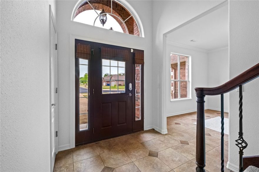 Welcome to this wonderful, North facing home in Wildwood Subdivision! Beautifully updated and ideally located, this Bentonville gem offers style, comfort, and convenience! Just minutes from Downtown Bentonville, Coler trails, top-rated public schools, and major corporate offices, this home is perfect for enjoying all the area has to offer. Inside, you’ll love the modern upgrades, including stunning quartz countertops in the kitchen and bathrooms, a fully remodeled upstairs bath, sleek light fixtures, and a fresh full interior repaint. A new roof, gutters, and windows provide peace of mind and long-term value. Newer laminate flooring throughout the upstairs adds a warm, cohesive feel. The open layout provides great flow for everyday living and entertaining. Whether you're relaxing at home or exploring nearby dining, shopping, and trails, this move-in ready home puts you in the center of it all. Don’t miss your chance to own a stylishly upgraded home in one of Bentonville’s most sought-after neighborhoods!