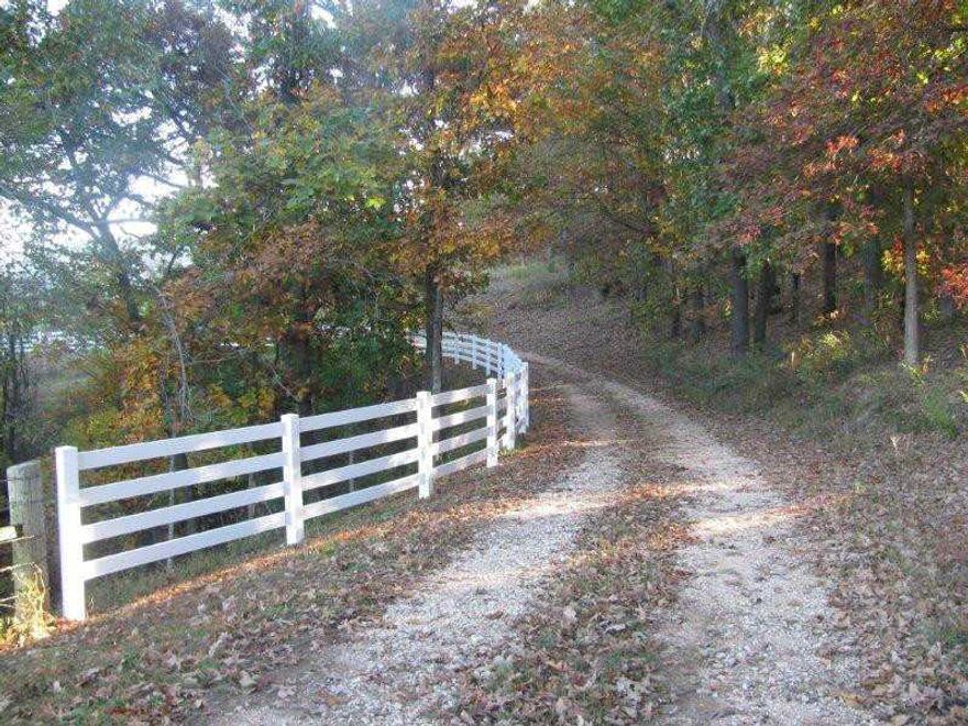 Beautiful horse/cattle ranch!  Five bd rm home has been freshly painted and new wood floors in LR, DR, office and hall.  New carpet in all bedrooms.  New architectural shingles in 2005.  Granite counter tops.  Rural water, 1 pond, good fencing.,Options available to purchase house with more or less acreage.