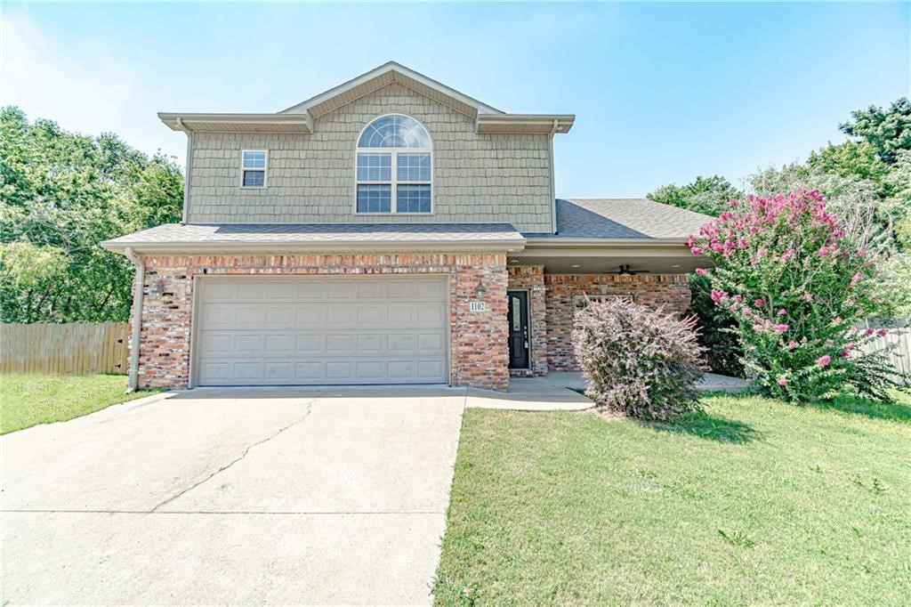 Introducing a charming 3 bedroom, 2.5 bathroom Bentonville home for lease. This spacious house features a kitchen island, wood floors, fenced back yard, fireplace, and a 2 car garage. The large master suite includes a jacuzzi garden tub for ultimate relaxation. Enjoy entertaining in the formal dining room or casual meals in the breakfast nook. The chef's kitchen is equipped with stainless steel appliances, perfect for cooking up delicious meals. With a large utility room complete with a sink, washer/dryer available if needed. This home offers convenience and comfort. Don't miss out on the opportunity to make this beautiful Bentonville house your new home.