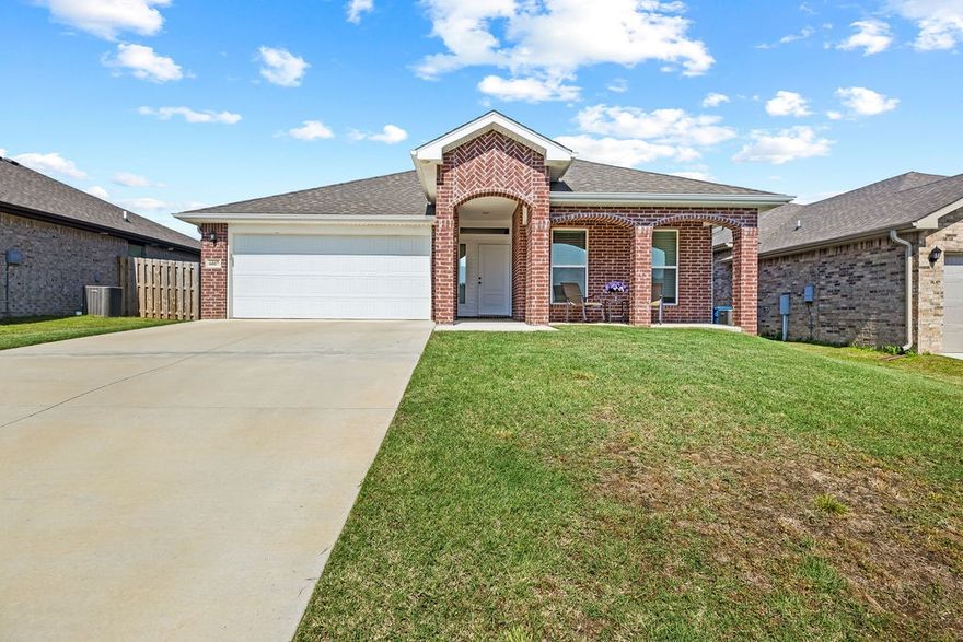 This property is USDA Rural Development eligible—0% down payment option!
Beautiful east facing 3-bedroom, 2-bath home that perfectly blends style and functionality. Featuring 10-foot ceilings in the main living area and a spacious open-concept layout, this home offers an inviting atmosphere ideal for both everyday living and entertaining.

The wood-look tile floors add warmth and durability, while arched doorways and a generous entryway provide architectural charm from the moment you walk in. The kitchen boasts granite countertops and flows seamlessly into the living and dining areas, where you’ll find a gas fireplace that adds both comfort and character.

Enjoy the outdoors from your covered front and back porches, perfect for morning coffee or evening relaxation. This home also includes a refrigerator, making it truly move-in ready.
Ring doorbell to convey.