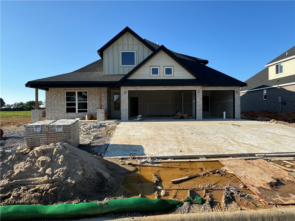 Concessions Include: $7500 from the Builder towards closing costs and get an additional 5k if you use the preferred Lender not to mention get the fence, blinds and gutters included. Welcome Home to Diamond Estates! Join us every Sunday 1-4 to learn about this amazing community with Clubhouse, Pool and within walking distance to Bentonville West High School. The Kale Plan has 4 bedrooms and 3.5 bathrooms with a bright and open floor plan. The amazing kitchen has a large pantry, tons of natural light and large dining area. Leading off the dining is a large covered porch with fire place to enjoy cool evenings looking at the Neighborhood pond! Granite countertops, designer lighting, soft close cabinets, wood floors, stained beams and shiplap accents make this one a must see!