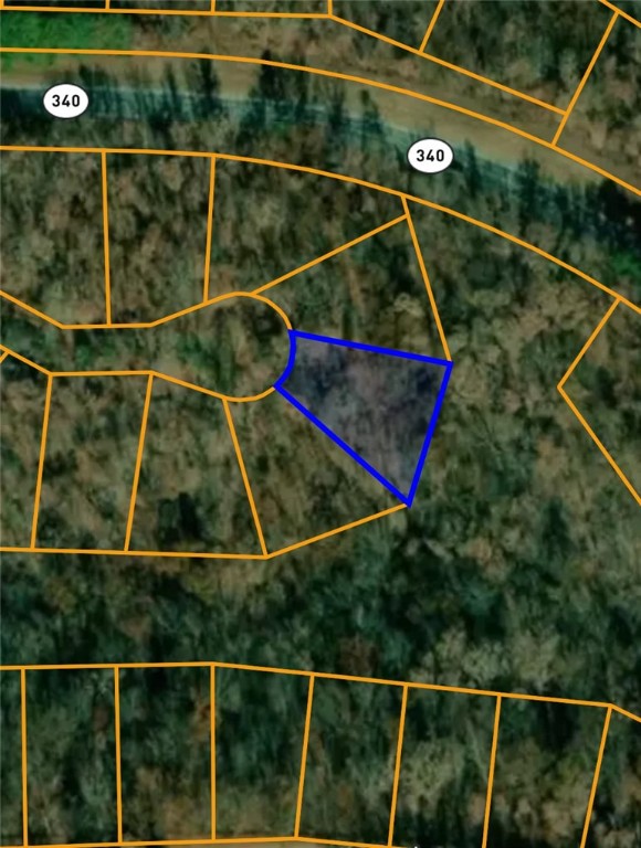 Situated on a quiet cul-de-sac in the Lindsey Subdivision of Bella Vista, this 0.26-acre lot offers a peaceful, wooded setting ideal for building or investment. Located in Benton County and within the sought-after Bentonville School District, the property provides convenient access to Bella Vista’s renowned trail systems, lakes, golf courses, and other community amenities. A great opportunity to enjoy the natural beauty and outdoor lifestyle that Bella Vista is known for.